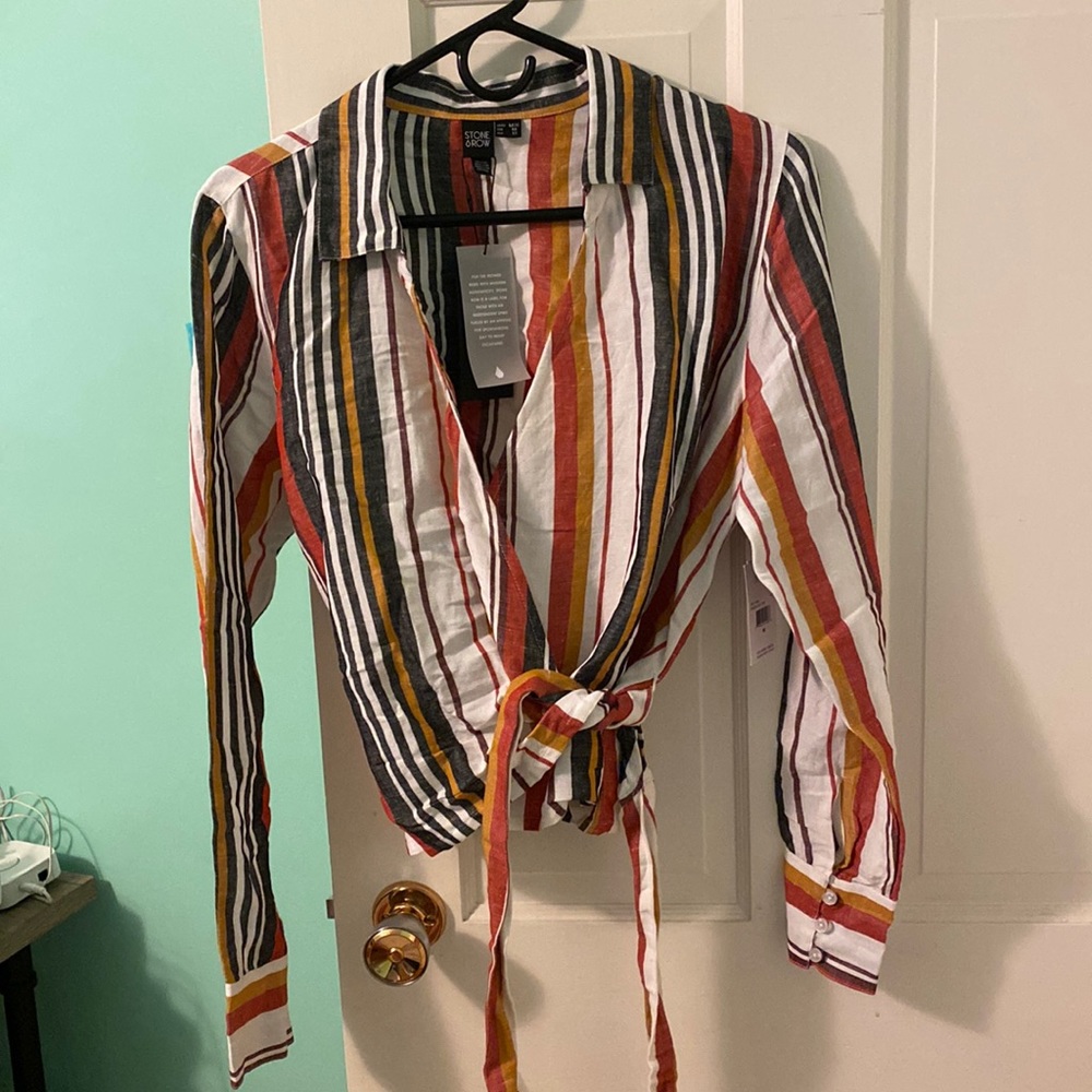 Brand new long sleeve wrap shirt. Size M.